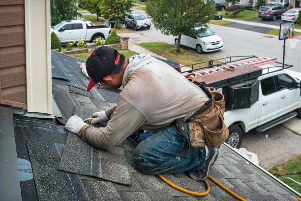 Professional Roofing technician working in Laughlintown, PA